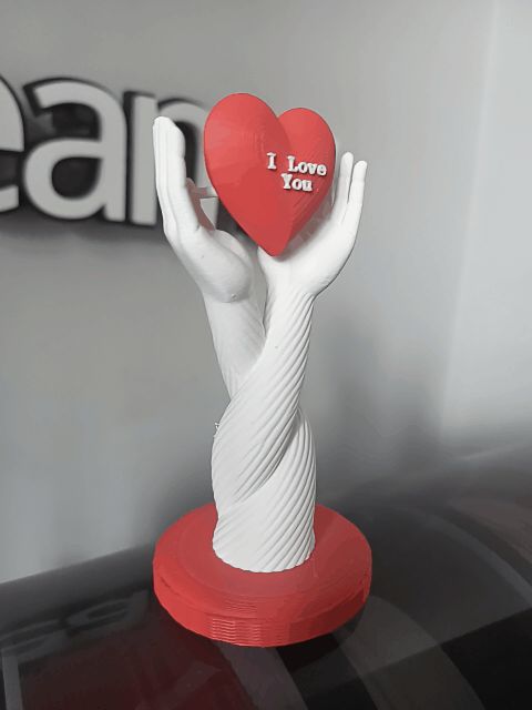 Hands Holding Floating Heart