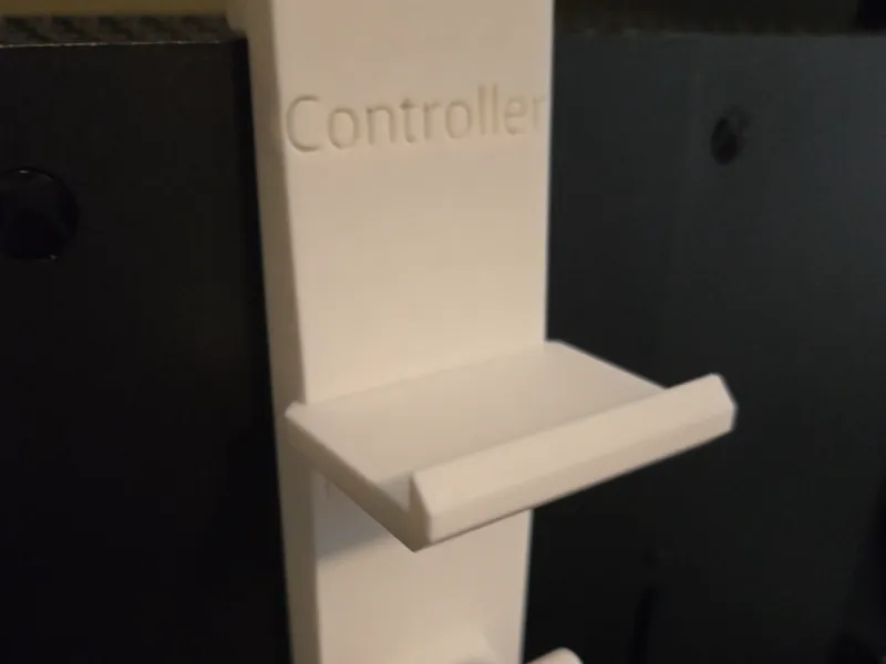 Xbox X controller and Headset holder for on top.
