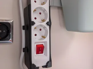 universial Powerstrip-Holder with instructions