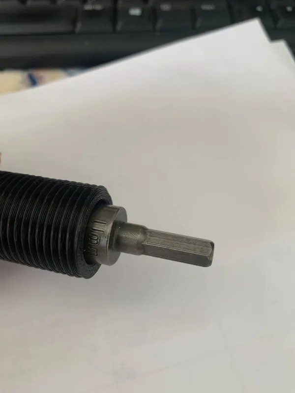 Bobine hexagonale 11 mm pour enrouleur de filament sur perceuse
