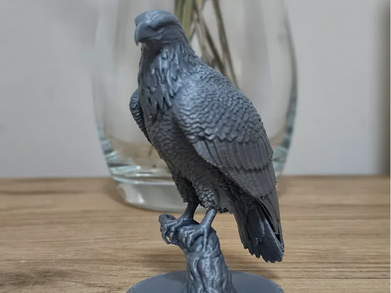 Eagle on wooden ranch