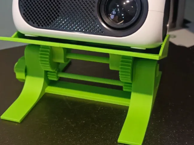 Adjustable holder for a mini projector