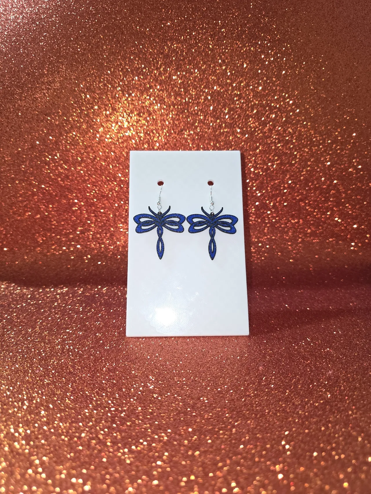 Mystical dragonfly intertwined earrings view 2