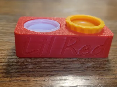 Gecko feeding ledge for bottle caps 