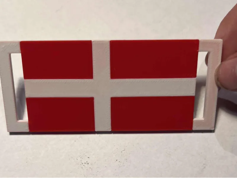 Gavemærke med Dansk flag