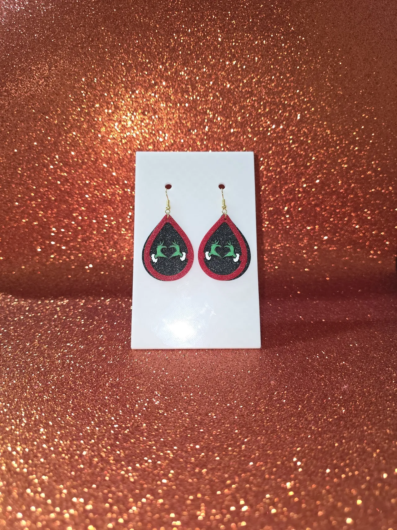 Heart Grinch in a drop earrings view 2