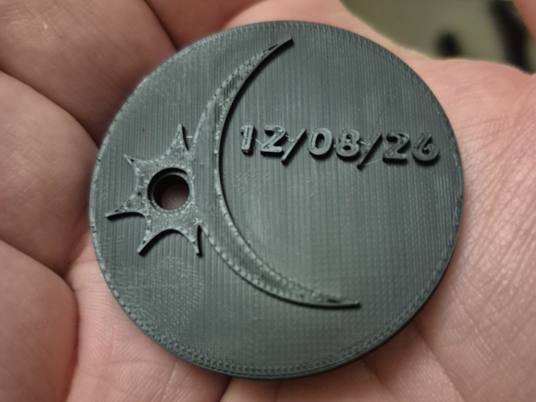 Solar Eclipse pinhole coin - 1