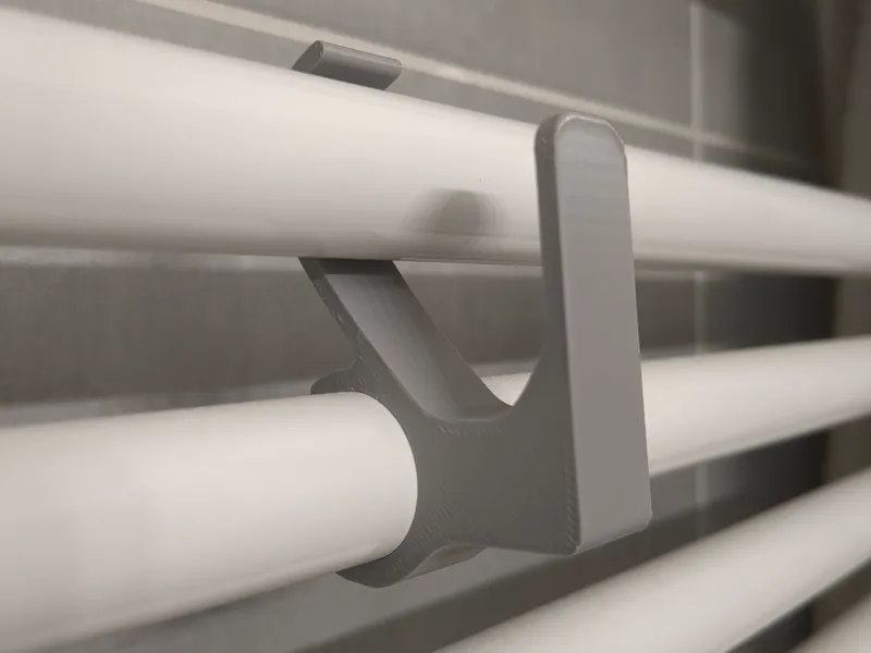 Radiator towel hook - single piece