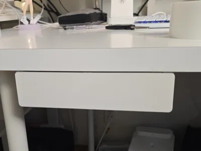 Under-desk drawer with stopper