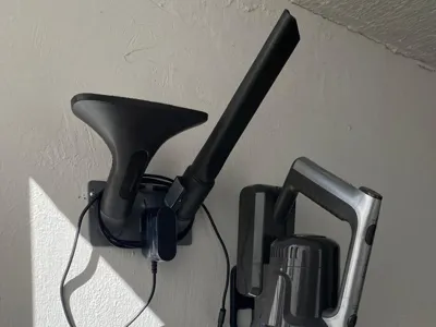 Koblenz vacuum attachment and charger holder