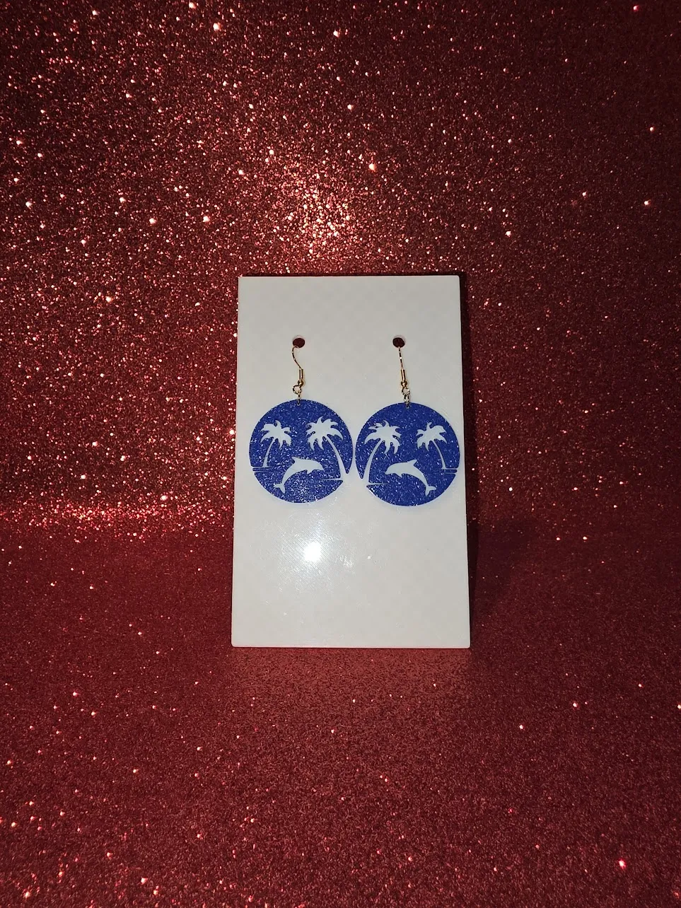 Marine background earrings view 2