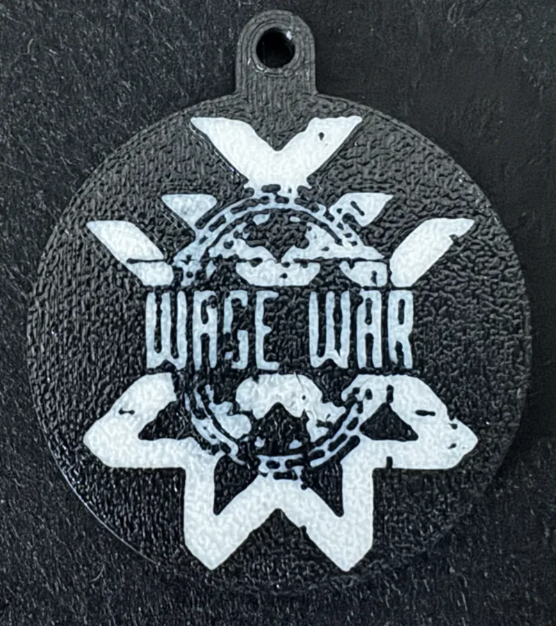 A keychain inspired by the band Wage War
