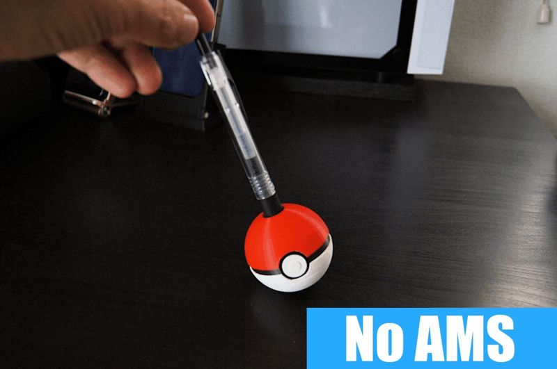 Poké Ball Tumbling Pen Holder / Desk Toy