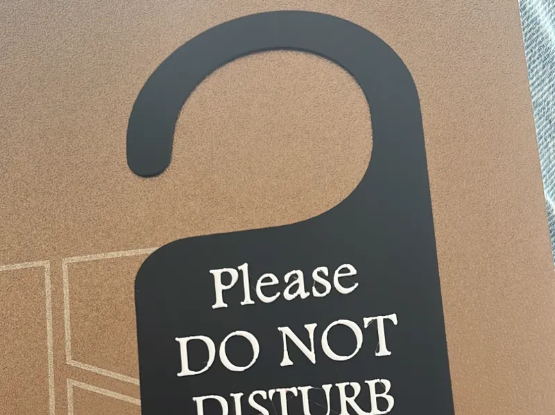 "Do not disturb" door hanger sign 