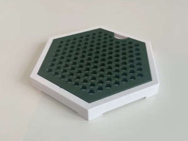 Dessous de verre hexagonal bicolore