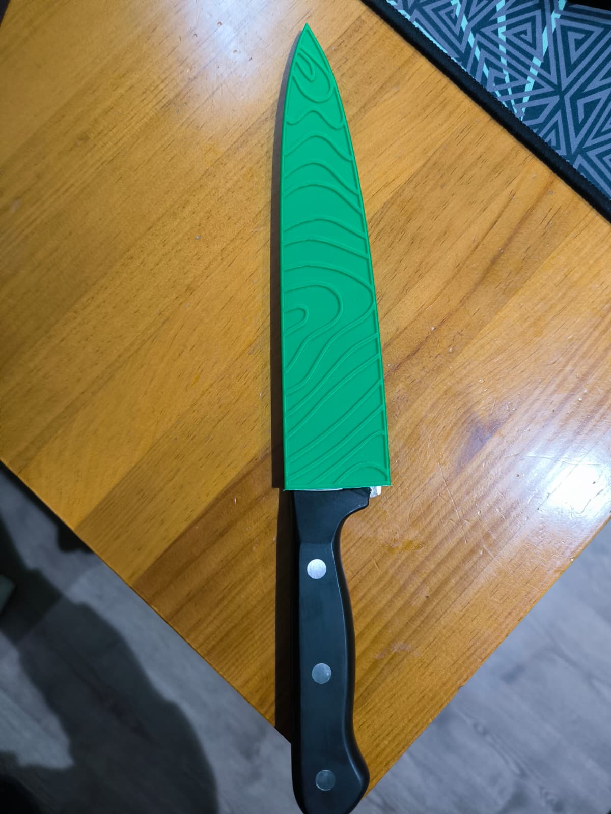 Miniatura 2 do modelo 3D Patterned knife sleeve