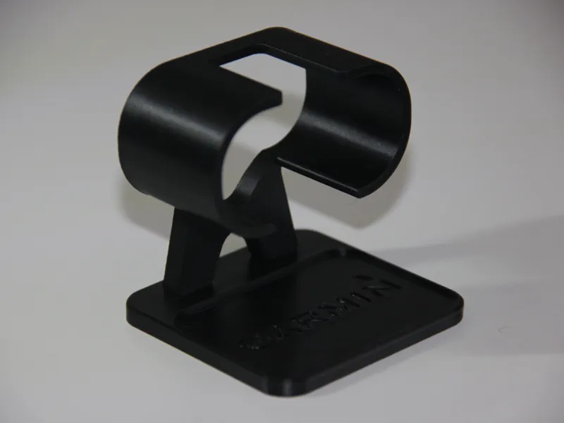 Watch stand with an integrated tray