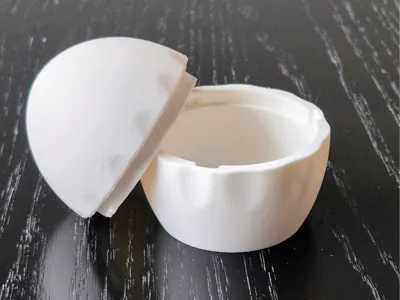 Egg-shaped container