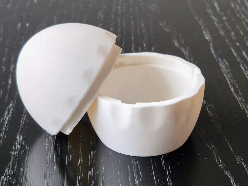 Egg-shaped container