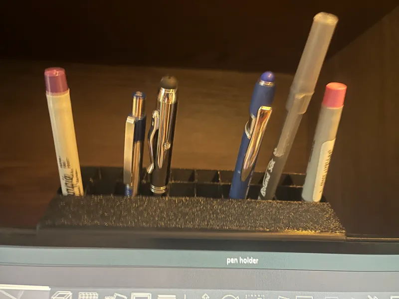 Monitor top pen holder, frameless
