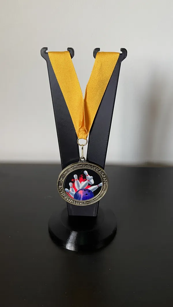 Support pour médaille
