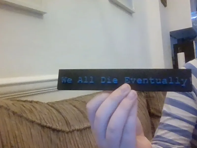 "We All Die Eventually!" Plaque