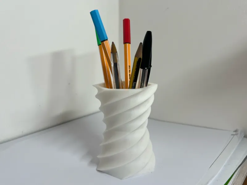 Spiral pencil / pen holder