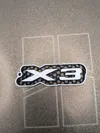 X3