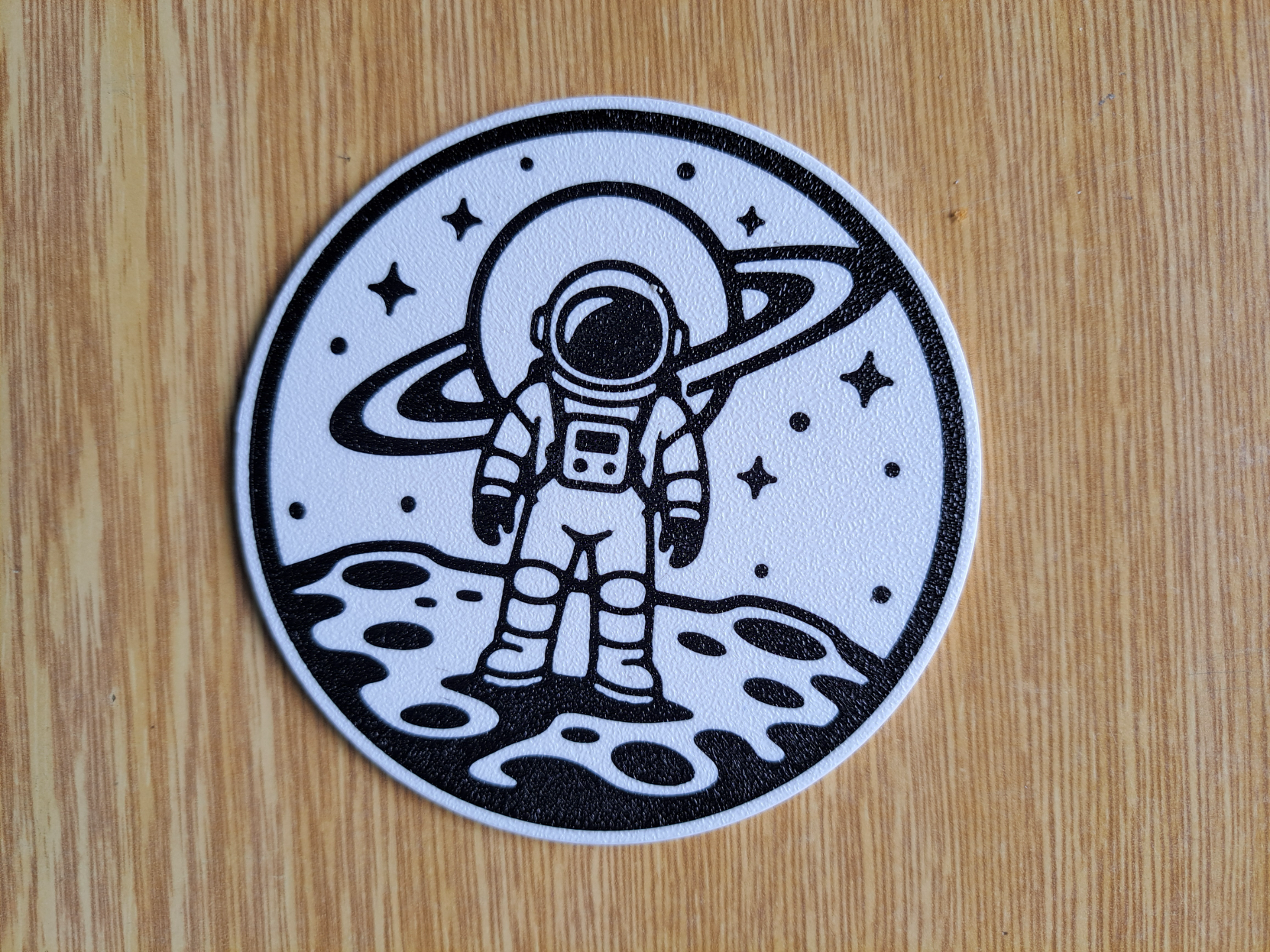 Astronaut on Saturn Moon Coaster