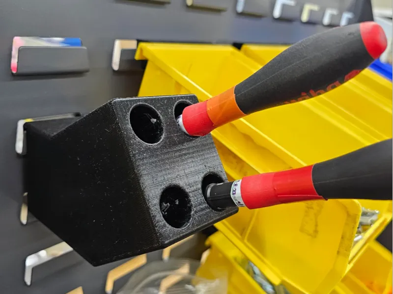 Precision screwdriver holder for metal racks.