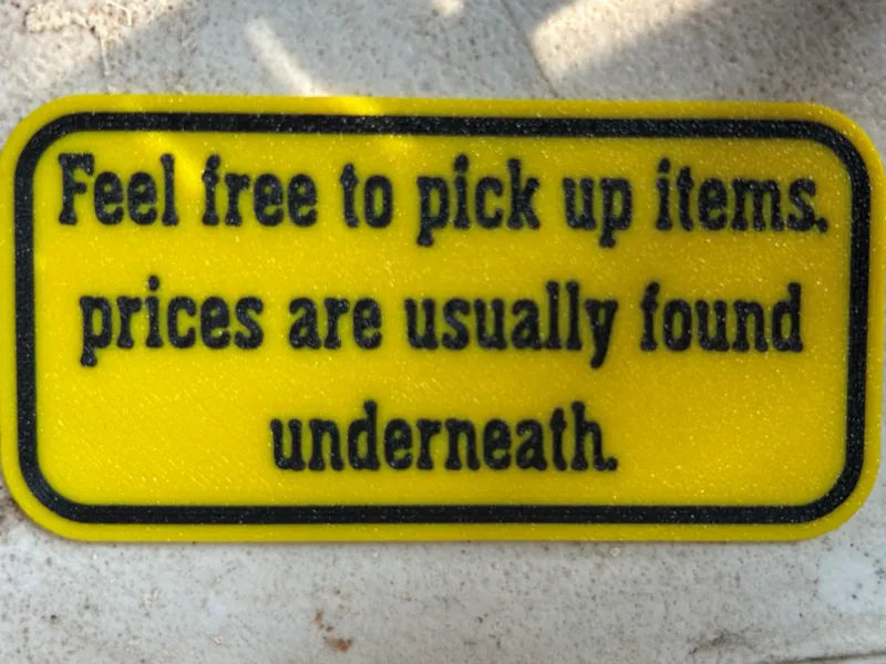 Vendor table sign "Pick up for price"