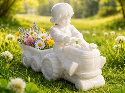 Little boy on a tractor with a trailer