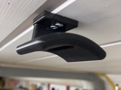 Ceiling mounted headset holder