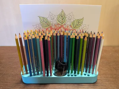 Holder for 68 pencils, sharpener + sheets of paper