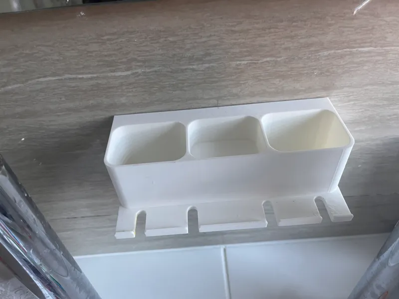 Toothbrush wall holder