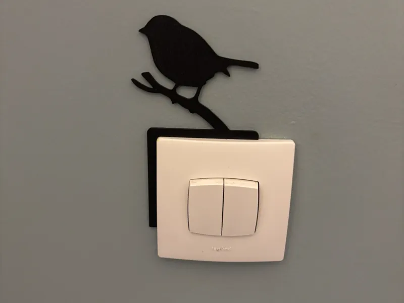 Décoration prise ou interrupteur oiseau