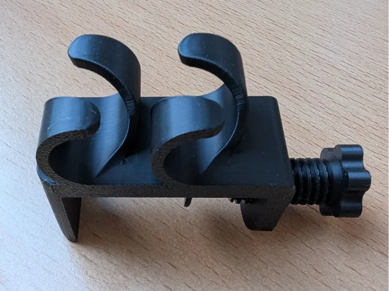 Desk cable management guide with mounting clamp