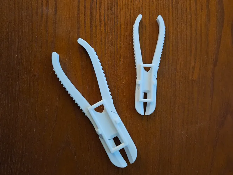 Hose Clamp with clips to hold handle straps