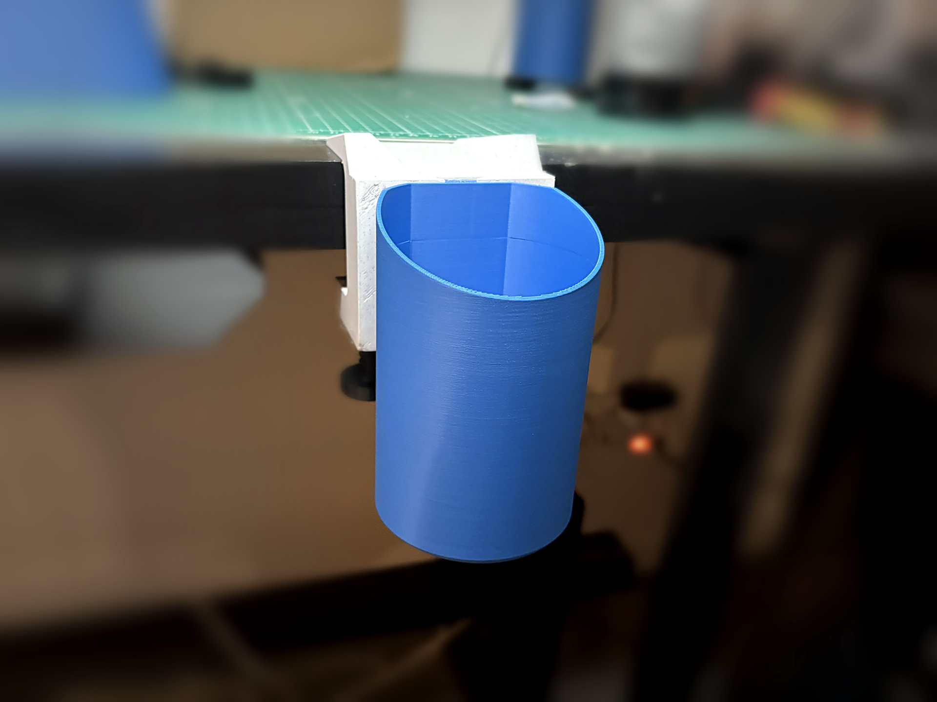 Clip. Modular desk bin that clamps on