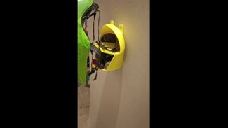 Bicycle helmet holder with hidden organizer