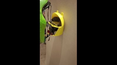 Bicycle helmet holder with hidden organizer