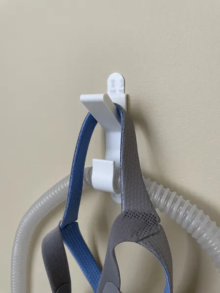 Crochet mural pour tuyau CPAP