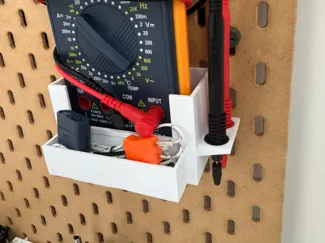 Skadis multimeter holder for a larger multimeter