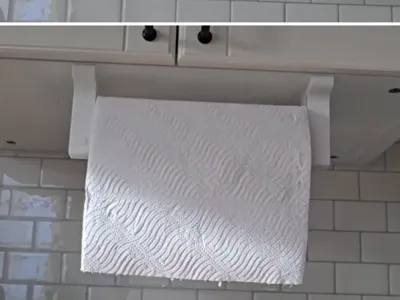 Kitchen roll holder with folding parts