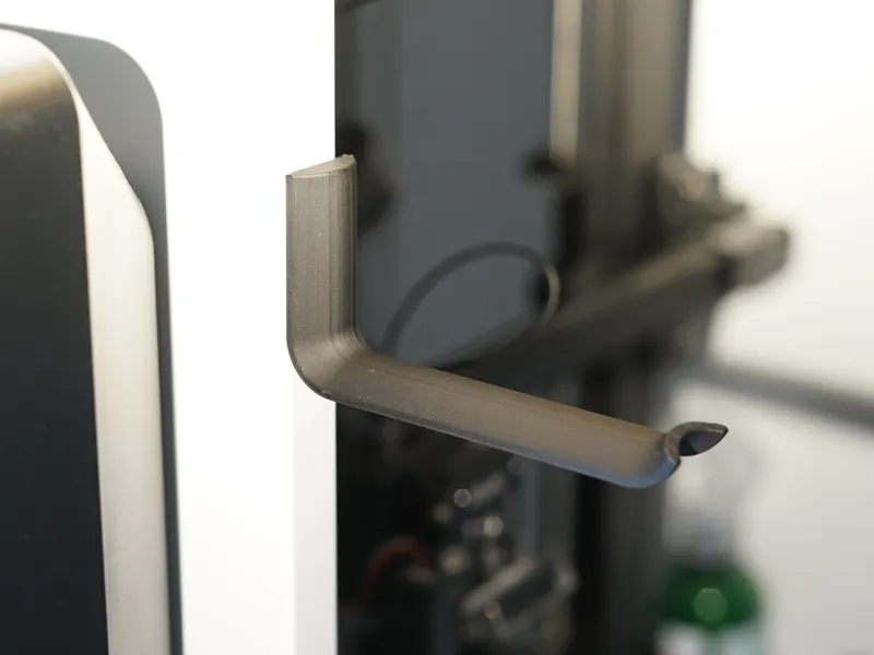 Long wall mounted hook with hidden screws