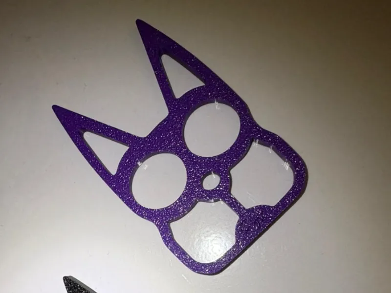 Cat Eyes Keychain two-finger brass knuckles