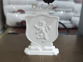 Emblema Royal Elite