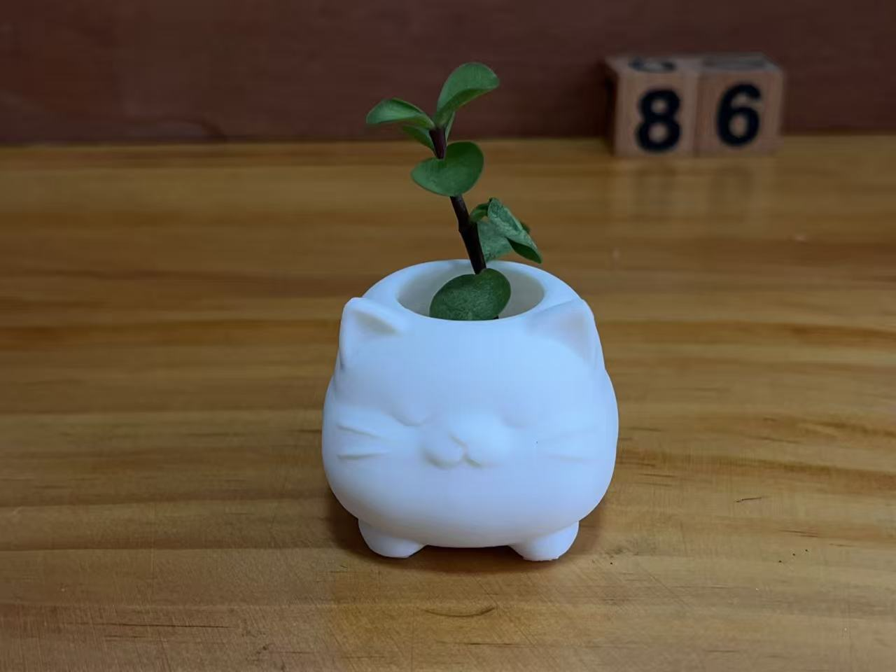圆滚滚的胖猫花盆桌面摆件玩具