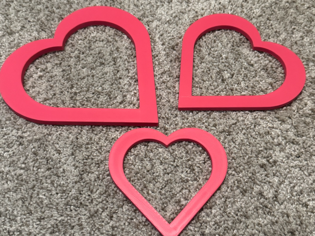 Heart shaped fish feeding barrier 