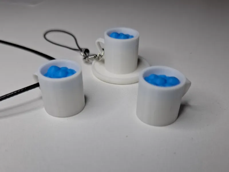 Cup with bubbling contents - trinket/charm